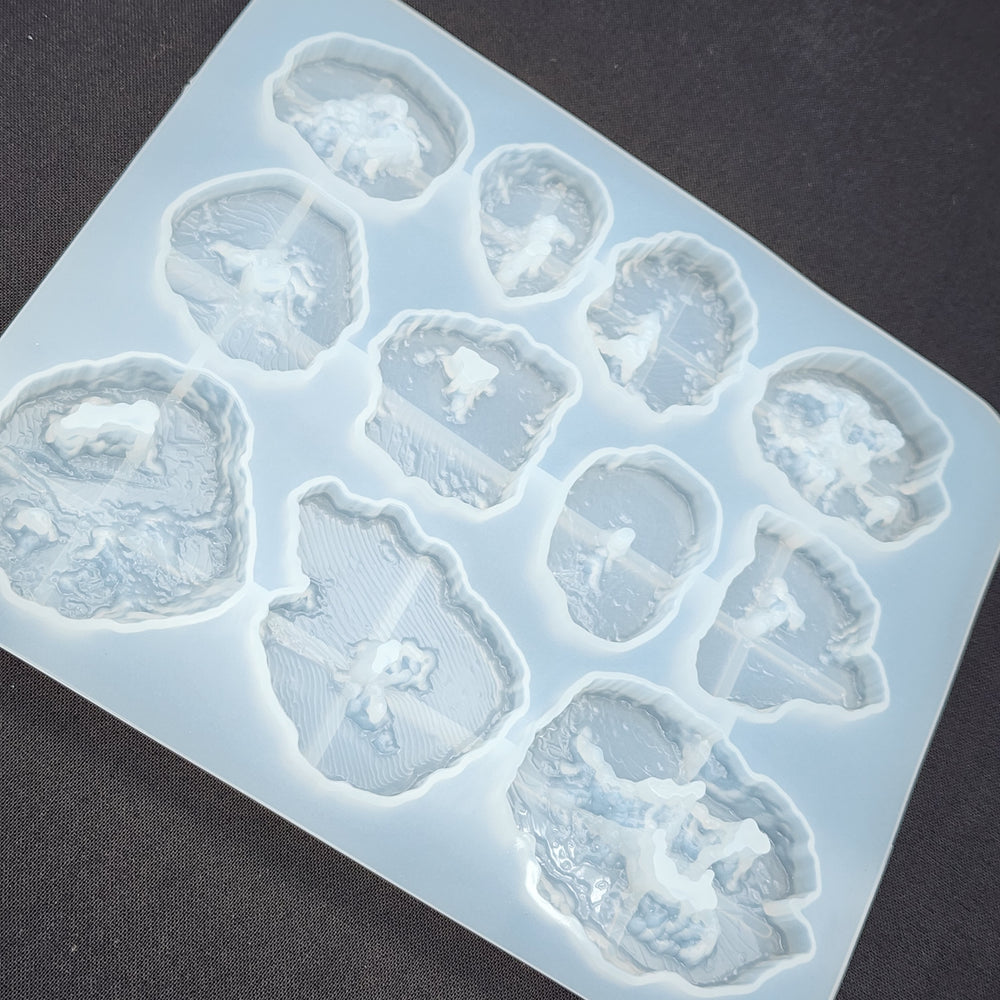 
            
                Load image into Gallery viewer, 11-Cavity Geode and Agate Slice Mold
            
        
