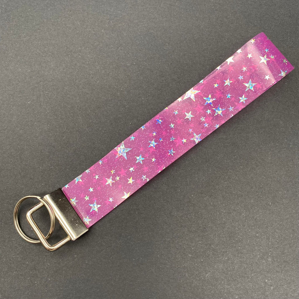 
            
                Load image into Gallery viewer, Holographic Star Wristlet Keychain - Pink
            
        