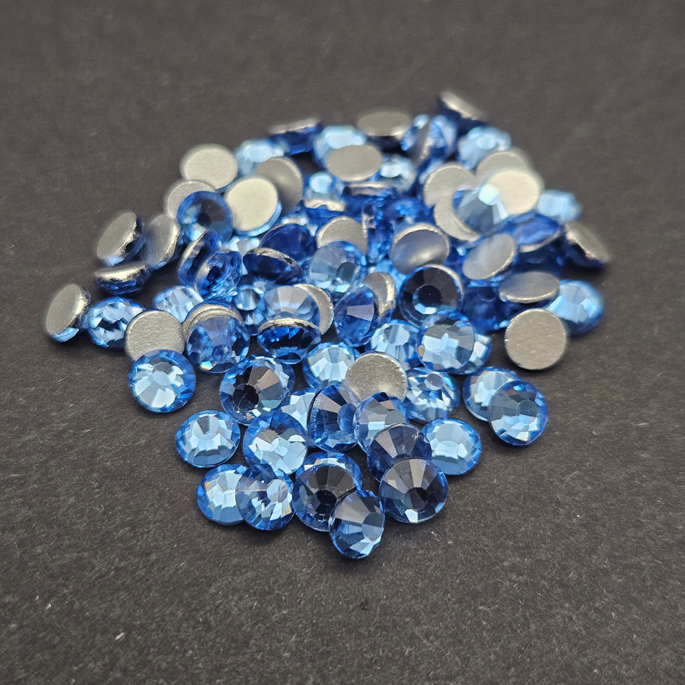 
            
                Load image into Gallery viewer, Single Color Rhinestones - Light Sapphire - GLASS
            
        